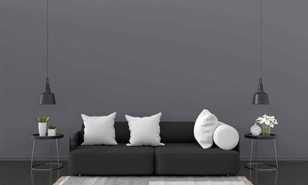 Add A Black Sofa With Black Walls