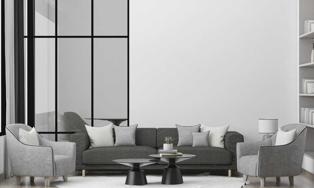 Black Sofa With Crisp White To Bring Freshness To The Living Room