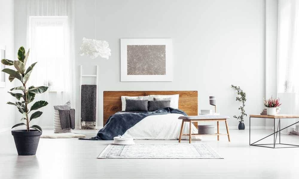 Paintings and Patterned Bedding Navy And Grey Bedroom Walls